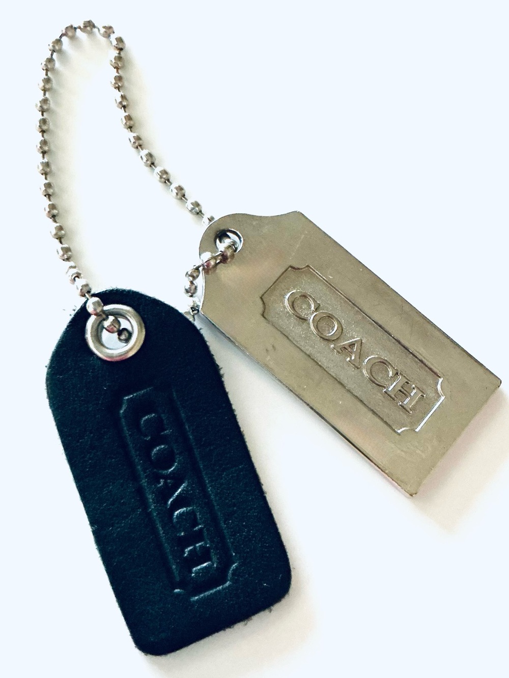 COACH, Black Leather and Silver Metal Tag Keychains